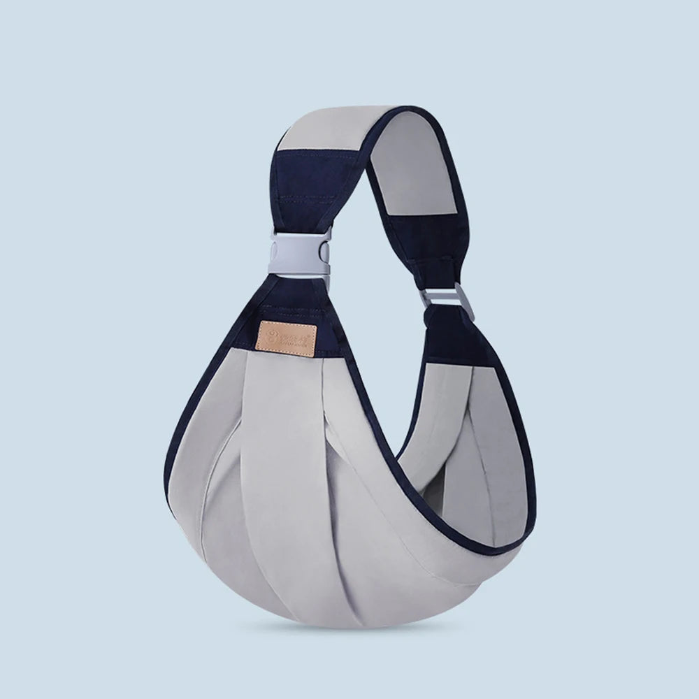 Porte bébé ergonomique vert ajustable et pratique"