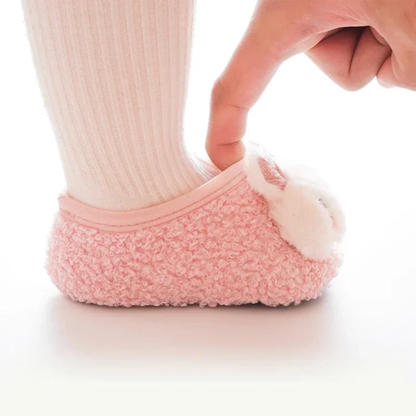 "Chaussons bébé roses ultra-doux avec semelle antidérapante"