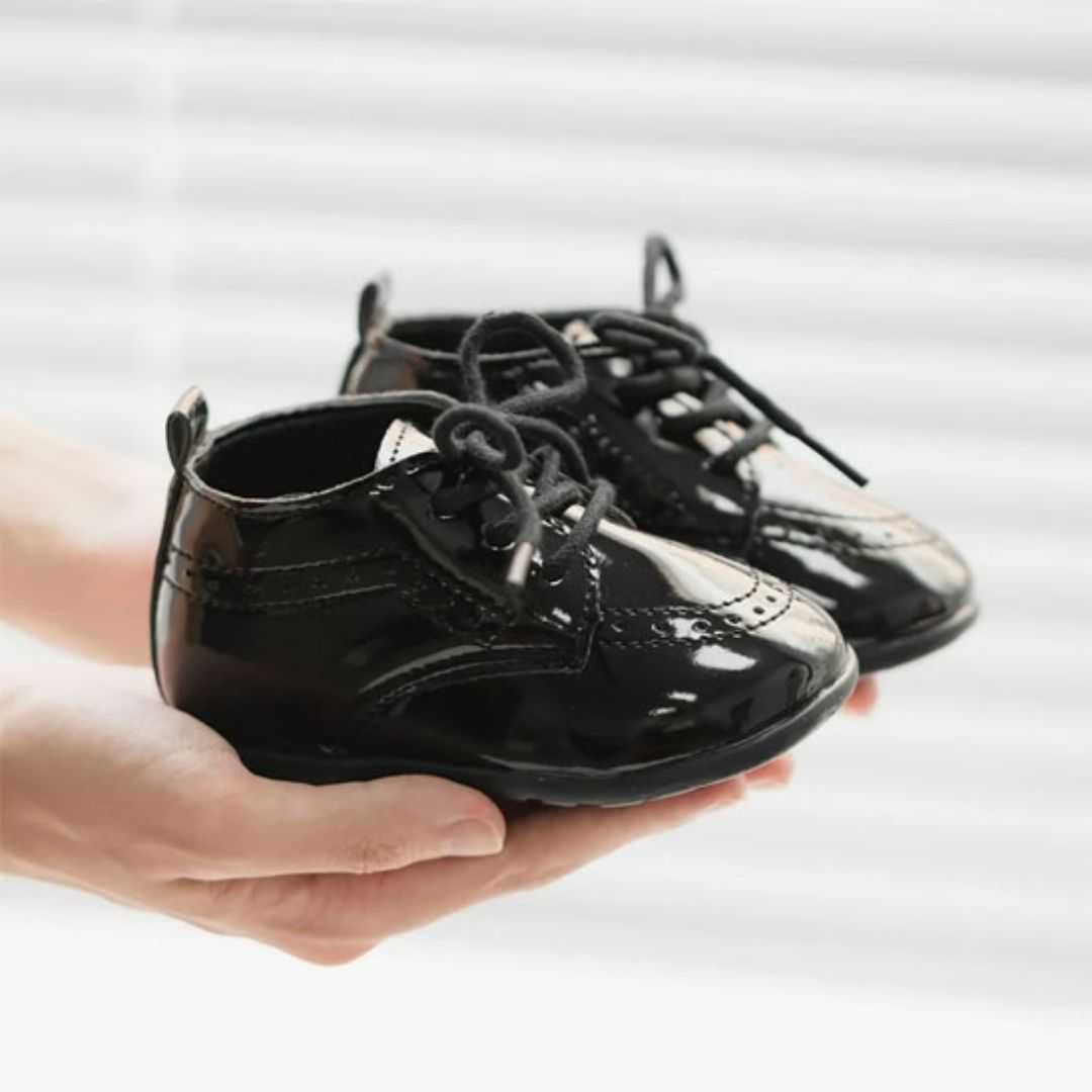 Chaussures bébé noires confortables pour apprentissage marche"