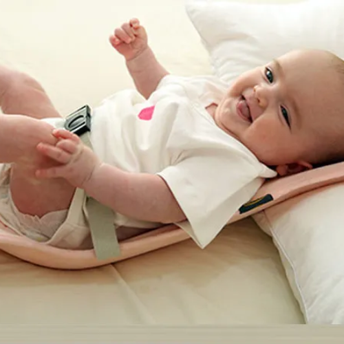 Coussin d'allaitement rose doux pour petite fille confort