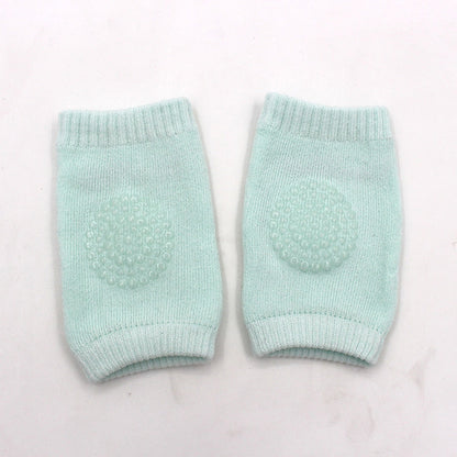 Genouillères turquoise ajustables pour bébé actif"