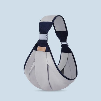 Porte bébé ergonomique vert ajustable et pratique"
